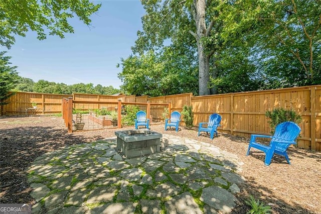 2304 Mitford Ct, Dacula, GA 30019 - fenced backyard with a garden