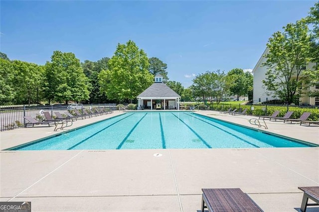 2304 Mitford Ct, Dacula, GA 30019 - community pool with a patio