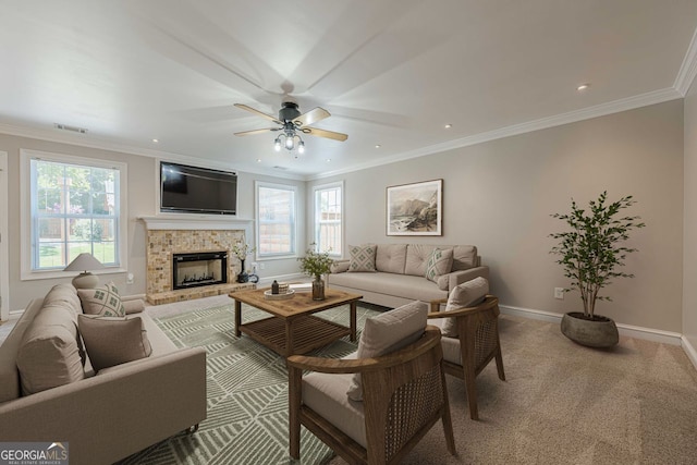 2304 Mitford Ct, Dacula, GA 30019 - living area with plenty of natural light, ceiling fan, baseboards, crown molding, and carpet floors