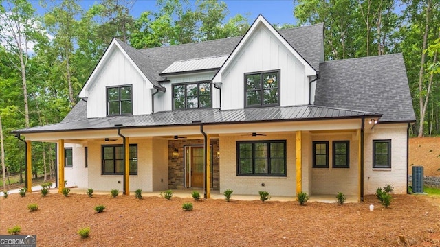 225 Laurel Place Dr, Cornelia, GA 30531 - modern farmhouse featuring ceiling fan, board and batten siding, brick siding, roof with shingles, and central AC