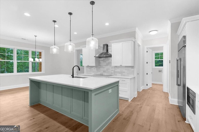 225 Laurel Place Dr, Cornelia, GA 30531 - kitchen featuring a sink, wall chimney exhaust hood, baseboards, black electric cooktop, and white cabinetry