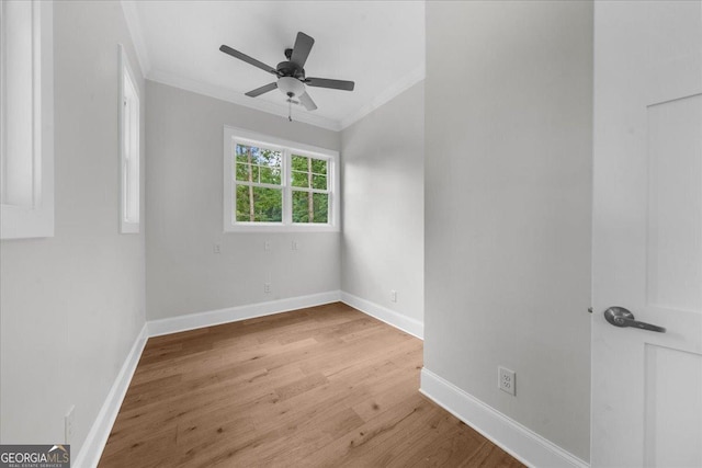 225 Laurel Place Dr, Cornelia, GA 30531 - unfurnished room with ornamental molding, baseboards, wood finished floors, and ceiling fan
