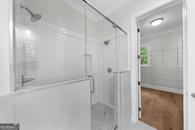225 Laurel Place Dr, Cornelia, GA 30531 - bathroom featuring crown molding and a shower stall