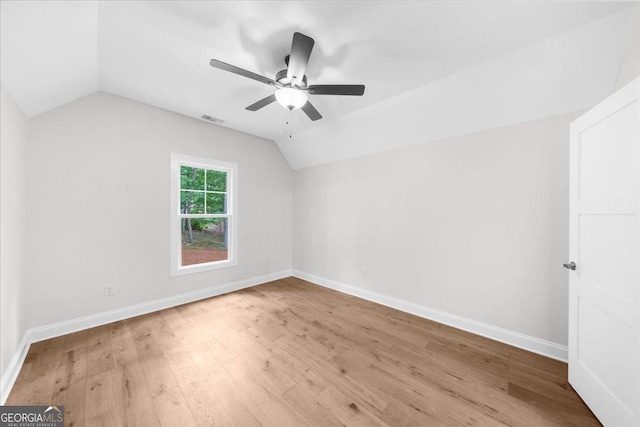 225 Laurel Place Dr, Cornelia, GA 30531 - additional living space with lofted ceiling, wood finished floors, ceiling fan, and baseboards