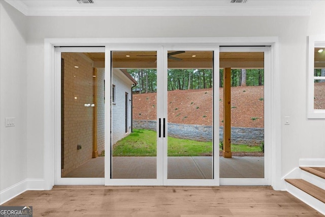 225 Laurel Place Dr, Cornelia, GA 30531 - entryway featuring wood finished floors, crown molding, and baseboards