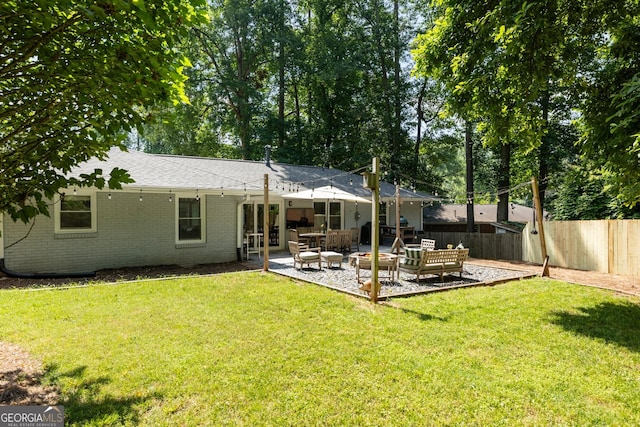 2164 Medfield Trl, Atlanta, GA 30345 - back of house featuring brick siding, a patio, and roof with shingles