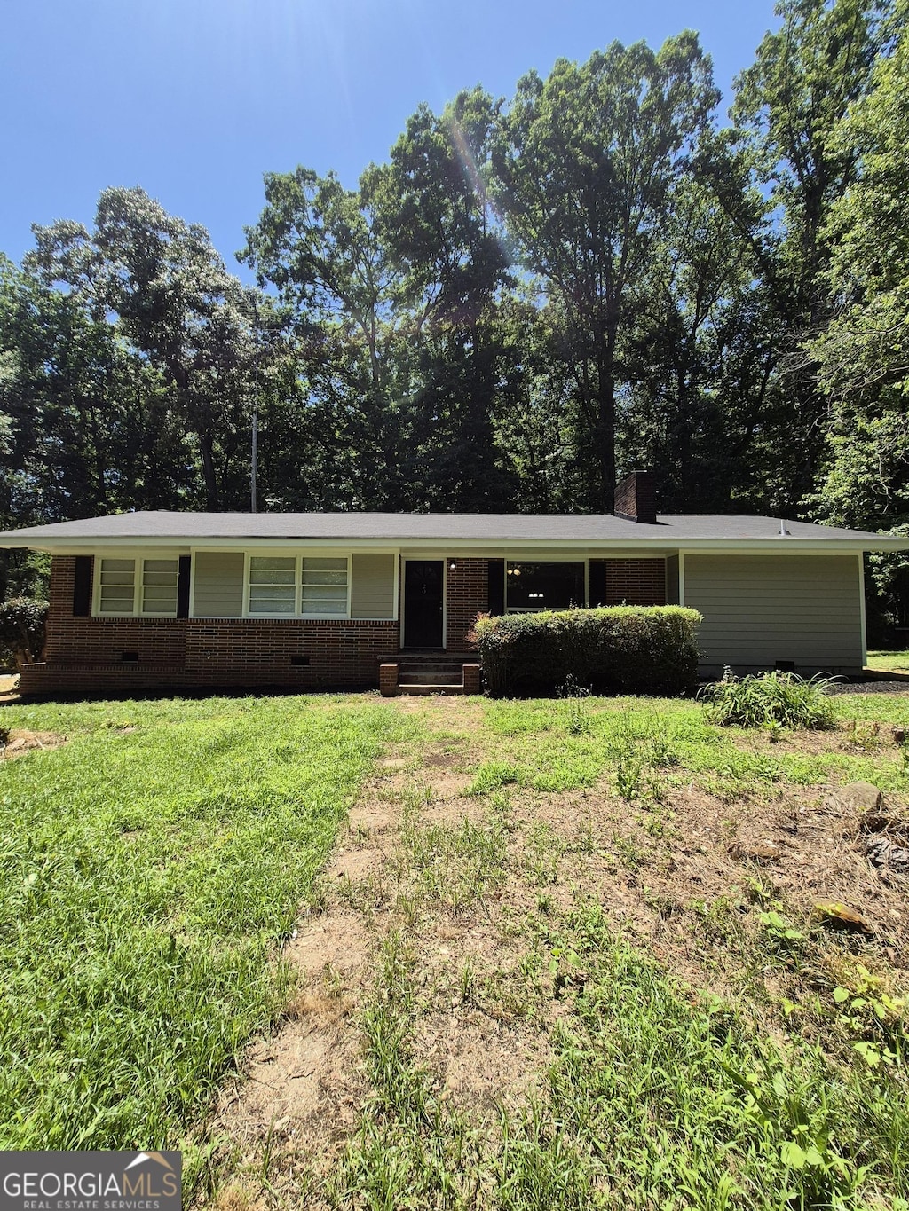 20 Hawks Rd, Nicholson, GA 30565 - ranch-style home featuring a front yard, brick siding, a chimney, and entry steps