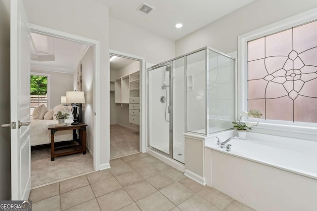 550 Mae Ln, Alpharetta, GA 30004 - ensuite bathroom with tile patterned flooring, a stall shower, a garden tub, and baseboards