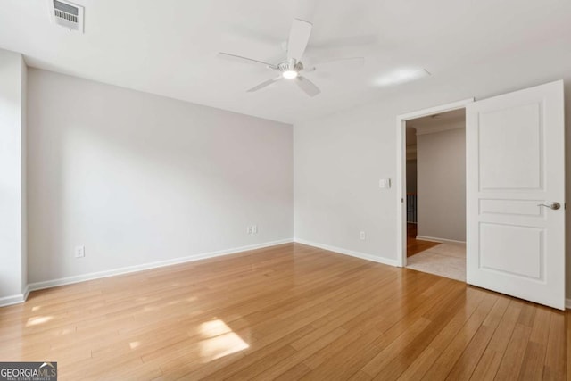550 Mae Ln, Alpharetta, GA 30004 - unfurnished room with ceiling fan, light wood finished floors, and baseboards