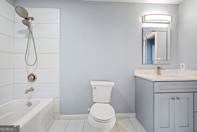 202 E 5th Ave, Winder, GA 30680 - full bath with toilet, baseboards, vanity, shower / tub combination, and tile patterned flooring