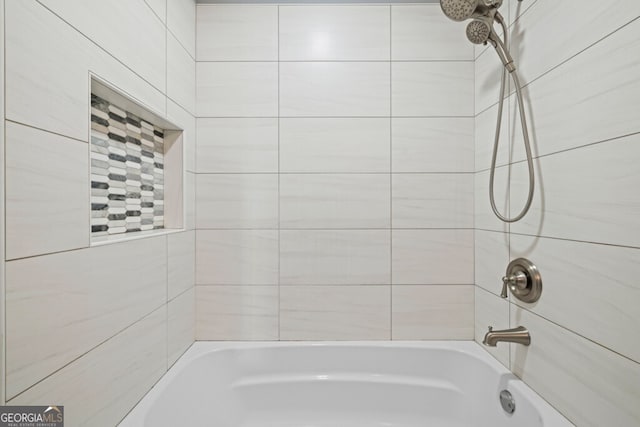 202 E 5th Ave, Winder, GA 30680 - bathroom featuring bathtub / shower combination