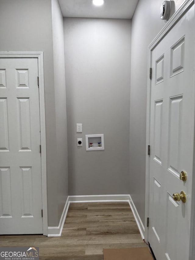 1300 Murphy Ave, Lagrange, GA 30240 - laundry room with electric dryer hookup, washer hookup, baseboards, and wood finished floors