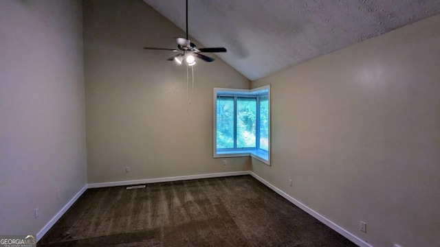 3246 Able Ct, Marietta, GA 30062 - empty room with a ceiling fan, vaulted ceiling, and dark colored carpet