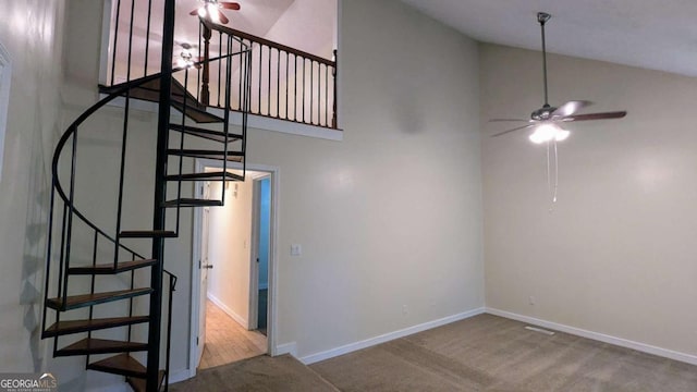 3246 Able Ct, Marietta, GA 30062 - staircase with ceiling fan, high vaulted ceiling, and carpet