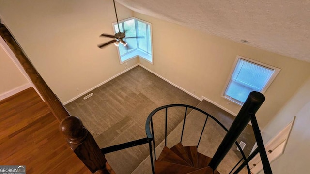 3246 Able Ct, Marietta, GA 30062 - stairs with a textured ceiling, ceiling fan, and lofted ceiling