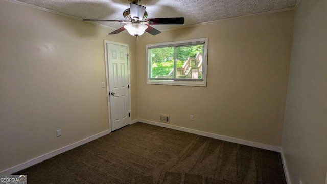 3246 Able Ct, Marietta, GA 30062 - spare room with crown molding, a ceiling fan, a textured ceiling, and dark colored carpet