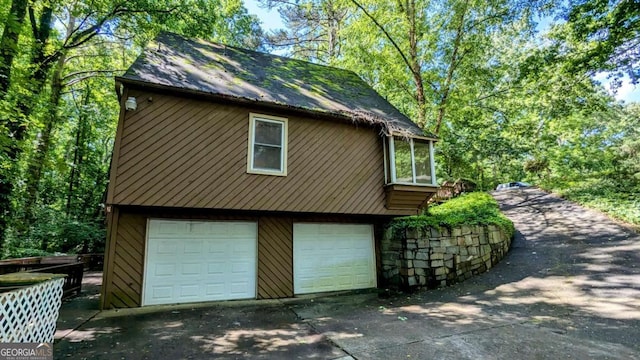 3246 Able Ct, Marietta, GA 30062 - view of side of property with concrete driveway