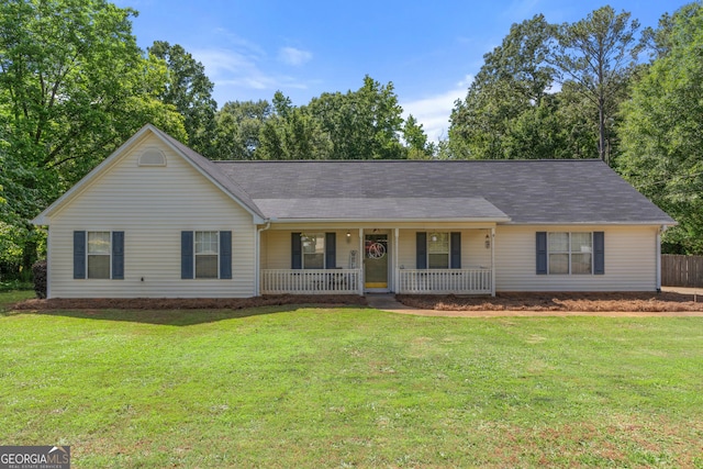 3005 Ryan Rd, Locust Grove, GA 30248 - ranch-style home with a porch and a front lawn