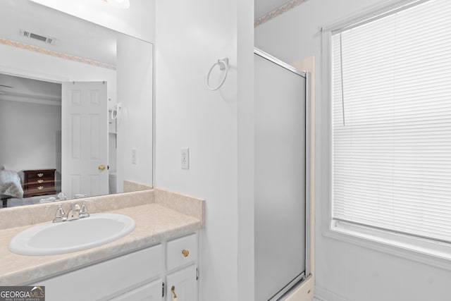3005 Ryan Rd, Locust Grove, GA 30248 - bathroom with connected bathroom, a shower stall, and vanity