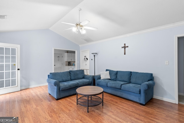 3005 Ryan Rd, Locust Grove, GA 30248 - living area featuring lofted ceiling, a ceiling fan, wood finished floors, baseboards, and ornamental molding