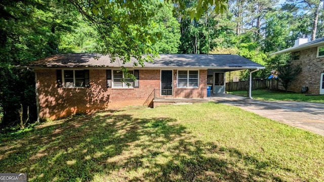 2569 Dobbs Dr NW, Kennesaw, GA 30152 - single story home featuring driveway, brick siding, and an attached carport