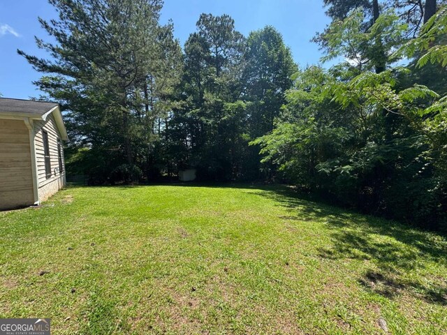120 Squirrel Way, Atlanta, GA 30349 - view of grassy yard