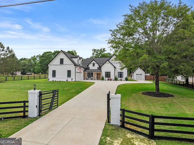 245 Mitchell Rd, Monroe, GA 30656 - modern farmhouse style home with board and batten siding and a standing seam roof