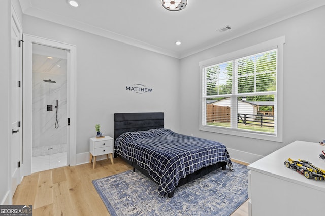 245 Mitchell Rd, Monroe, GA 30656 - bedroom featuring light wood finished floors, recessed lighting, crown molding, baseboards, and ensuite bath