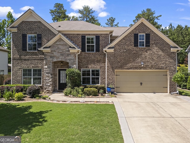 237 Parc Dr, Canton, GA 30114 - view of front of home featuring driveway, a front yard, brick siding, an attached garage, and stone siding