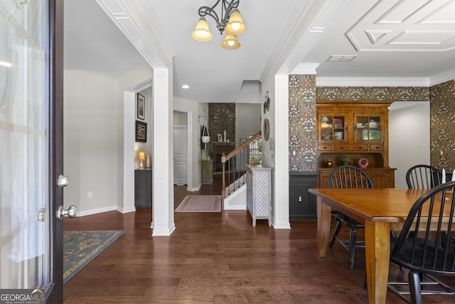 237 Parc Dr, Canton, GA 30114 - dining area with wood finished floors, stairs, crown molding, and a chandelier