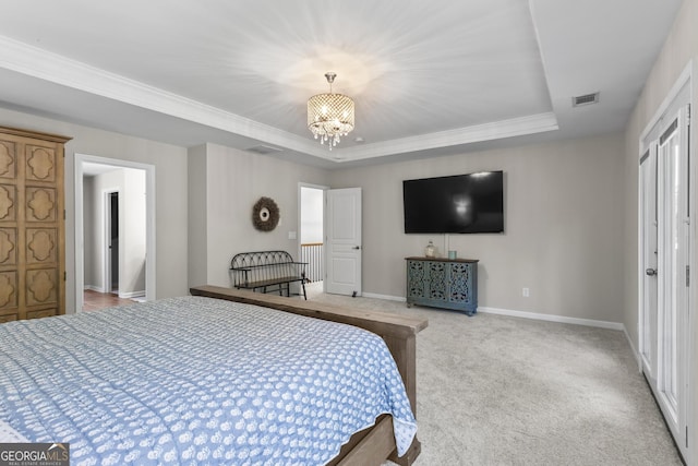 237 Parc Dr, Canton, GA 30114 - carpeted bedroom with a chandelier, a raised ceiling, and ornamental molding
