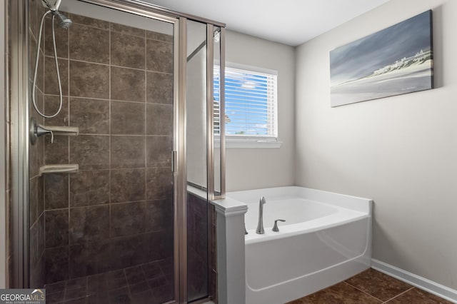 237 Parc Dr, Canton, GA 30114 - full bath featuring a shower stall, a garden tub, and tile patterned flooring