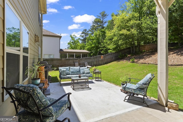 237 Parc Dr, Canton, GA 30114 - fenced backyard with an outdoor living space, a patio area, and area for grilling