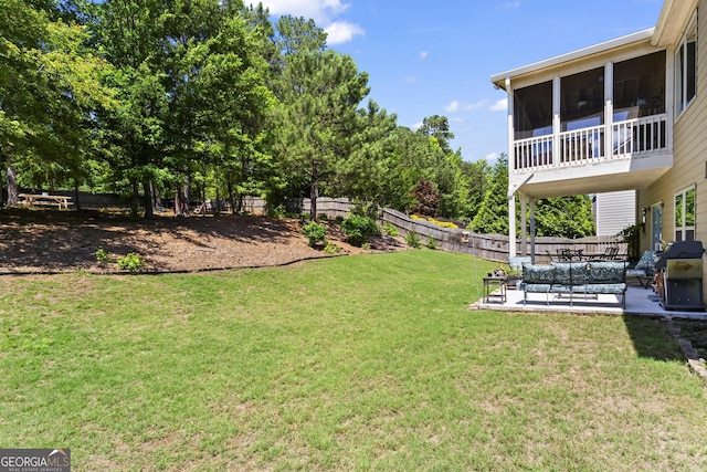 237 Parc Dr, Canton, GA 30114 - fenced backyard featuring a patio area and an outdoor living space