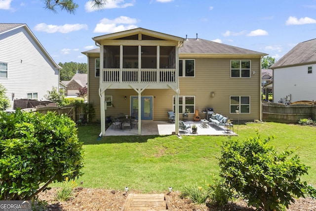 237 Parc Dr, Canton, GA 30114 - rear view of house featuring a patio, a fenced backyard, and a sunroom