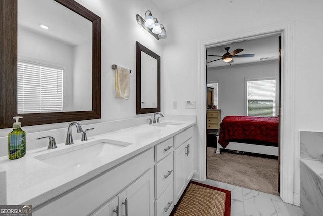 4565 Sims Park Overlook, Suwanee, GA 30024 - full bath with marble look tile flooring, ceiling fan, double vanity, and connected bathroom