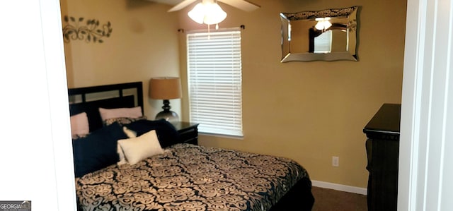 111 Tyndall St, Perry, GA 31069 - bedroom with baseboards and ceiling fan