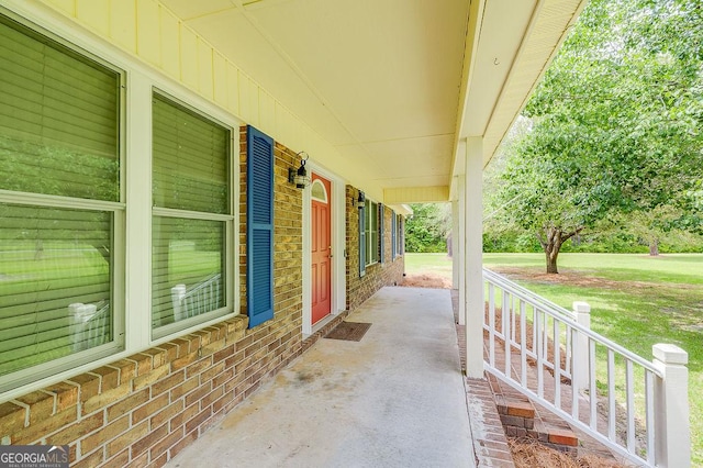 1282 Long Bridge Rd, Rincon, GA 31326 - covered porch with a lawn
