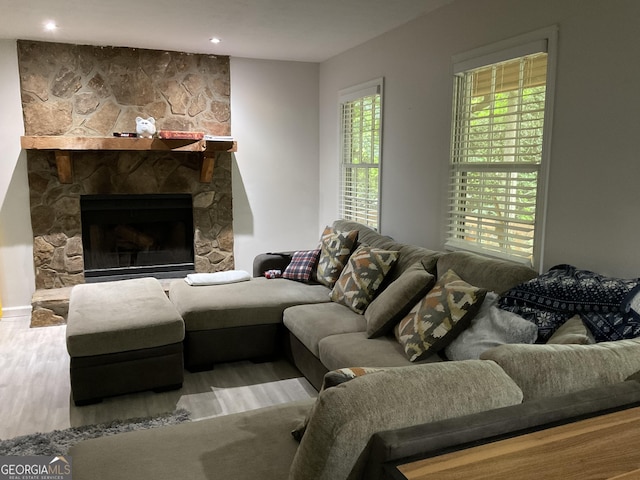 170 Beatrice St, Dallas, GA 30157 - living room with wood finished floors, a stone fireplace, and recessed lighting