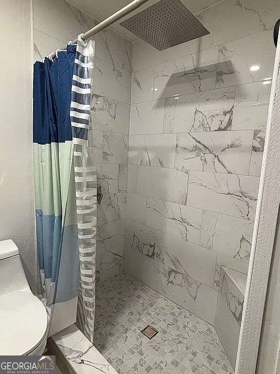 170 Beatrice St, Dallas, GA 30157 - full bath featuring tiled shower and toilet