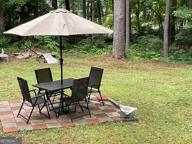 170 Beatrice St, Dallas, GA 30157 - view of green lawn featuring outdoor dining space and a patio area