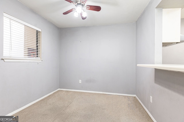 1818 Huntingdon Chase, Atlanta, GA 30350 - dining room with carpet flooring, a ceiling fan, and baseboards