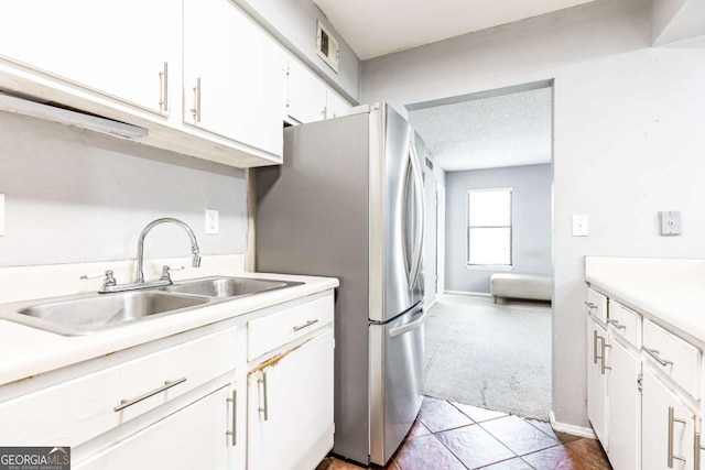 1818 Huntingdon Chase, Atlanta, GA 30350 - kitchen featuring appliances with stainless steel finishes, light countertops, white cabinets, and baseboards