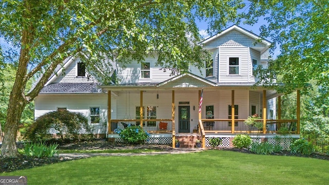 9035 Walnut Cove Ct, Gainesville, GA 30506 - victorian house with a front yard and covered porch