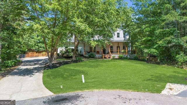 9035 Walnut Cove Ct, Gainesville, GA 30506 - view of front of home with a porch, a front lawn, and concrete driveway
