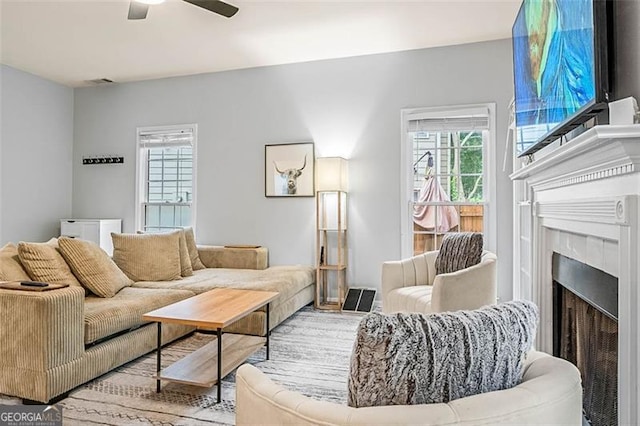 2865 Winter Rose, Dunwoody, GA 30360 - living area featuring a ceiling fan, a fireplace, and wood finished floors