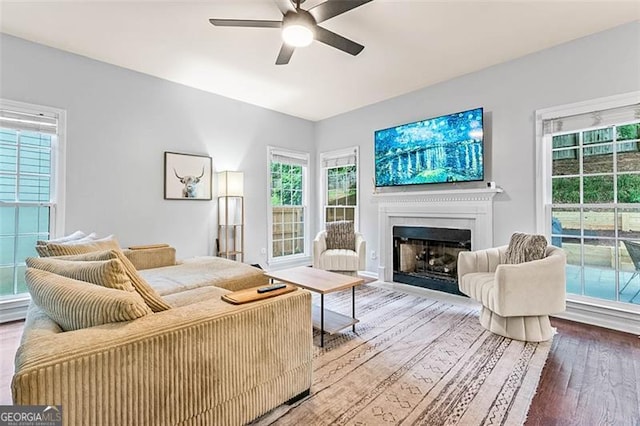 2865 Winter Rose, Dunwoody, GA 30360 - living room featuring a ceiling fan, wood finished floors, a fireplace, and plenty of natural light