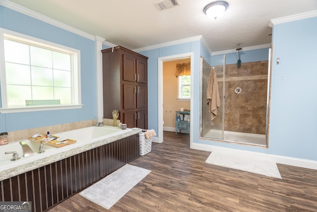 3251 Harrell Rd, Whigham, GA 39897 - full bath with a garden tub, a stall shower, wood finished floors, and ornamental molding