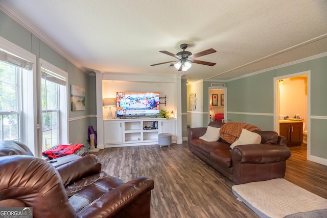 3251 Harrell Rd, Whigham, GA 39897 - living area with ornamental molding, wood finished floors, and a ceiling fan