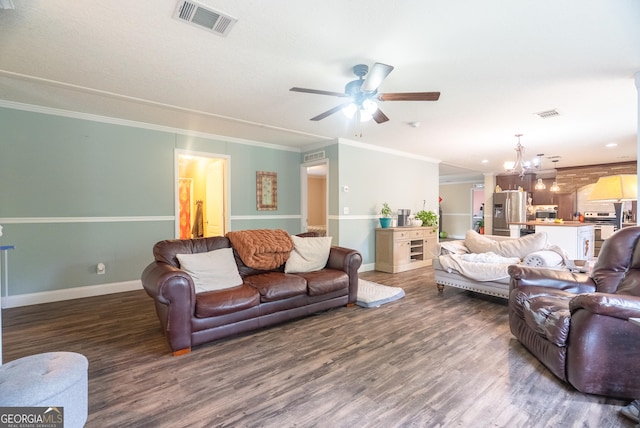 3251 Harrell Rd, Whigham, GA 39897 - living room featuring a chandelier, wood finished floors, a ceiling fan, and crown molding